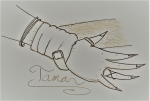 A man's hand tightly grasps the wrist of a woman whose arm and hand are decorated with jewelry. It is captioned Tamar.
