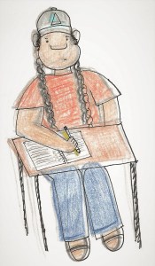 A young woman sits at a school desk writing in a notebook.