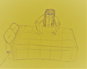 A woman makes her bed