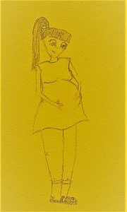 The woman holds her pregnant belly and smiles down at it.